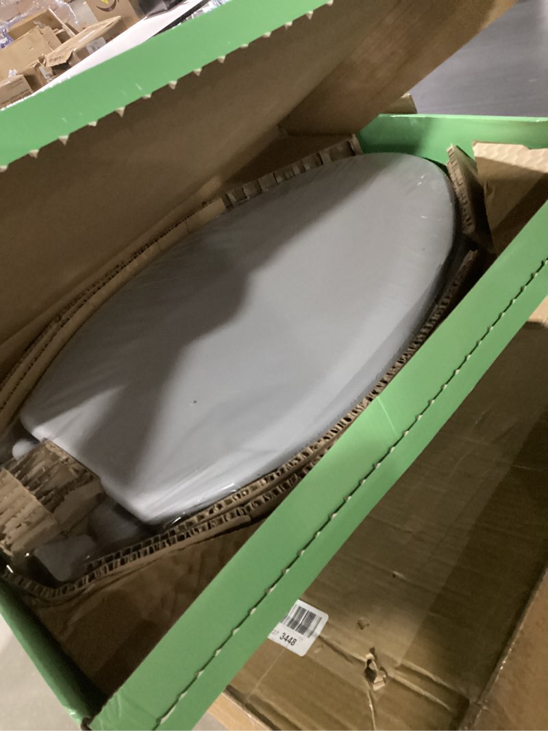 Condition photo showing New/Like New for toilet seat, slow close, soft touch, ultra-smooth matte finish (no orange-peel texture), premium moulded wood, quick release, piklids (gray, elongated) gray elongated