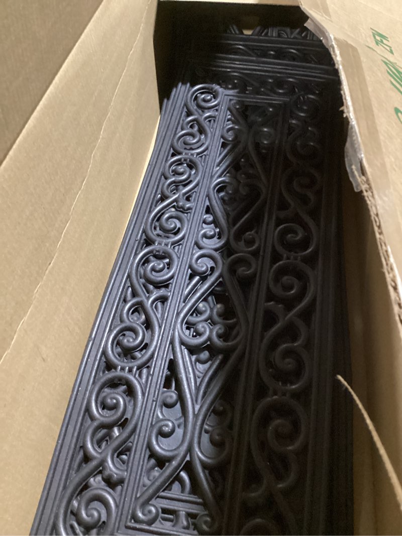 Condition photo showing As Is for Ottomanson Indoor/Outdoor Hose-Wash Iron Wrought Design Non-Slip Rubber 10" x 30" Modern Stair Treads for Stairs, Garage, Patio, 5 Pack, Black Wrought Black Scroll Lattice