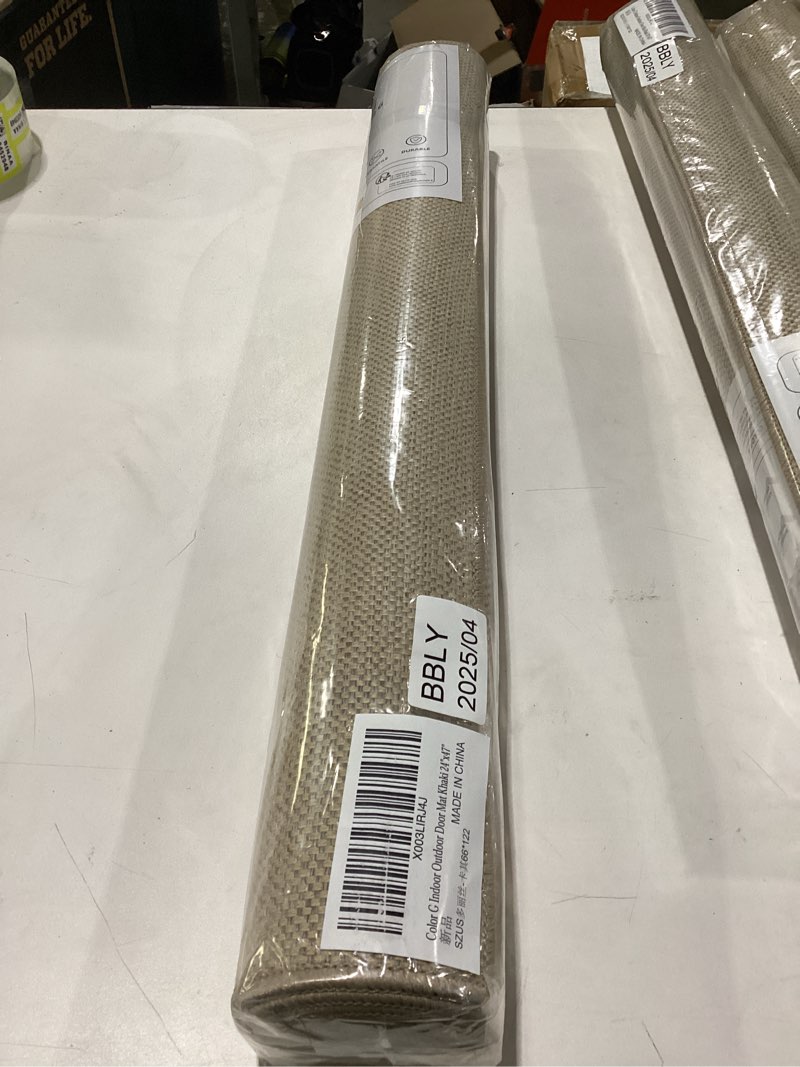 Condition photo showing New/Like New for color&geometry ultra-thin indoor door mat, 26"x47" low-profile non-slip entryway rug with modern geometric texture, washable doormat for indoor entrance, front door, khaki (rolled-up no creases) khaki 2'2" x 4' (rectangular)