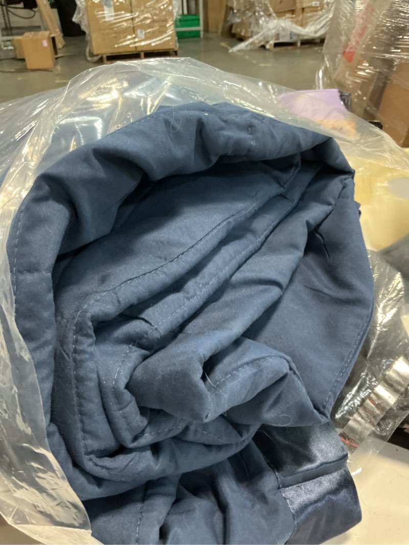 Condition photo showing As Is for madison park windom down alternative blanket, premium 3m scotchgard moisture wicking treatment, lightweight and soft bed cover for all season, satin trim, navy king