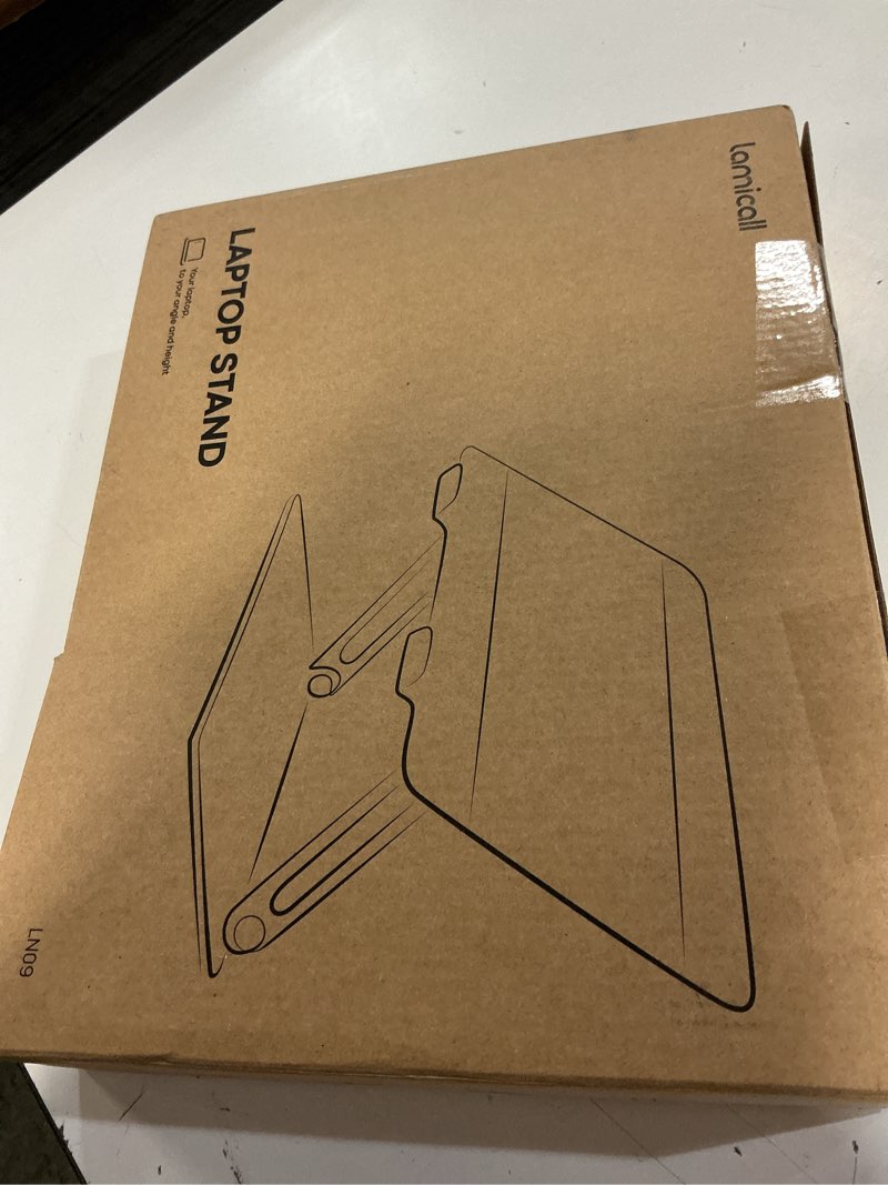 Condition photo showing New/Like New for lamicall adjustable laptop stand, portable laptop riser, aluminum laptop stand for desk foldable, ergonomic computer notebook holder for macbook air pro hp, office desk accessories (10-17.3'')- silver 1-silver