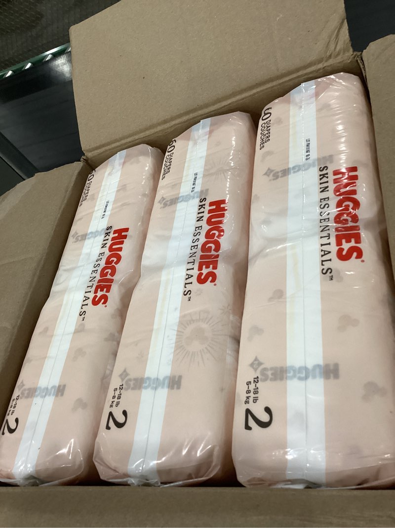 Condition photo showing New/Like New for Huggies Size 2 Diapers, Skin Essentials Baby Diapers, Size 2 (12-18 lbs), 180 Count (3 Packs of 60) Size 2 180