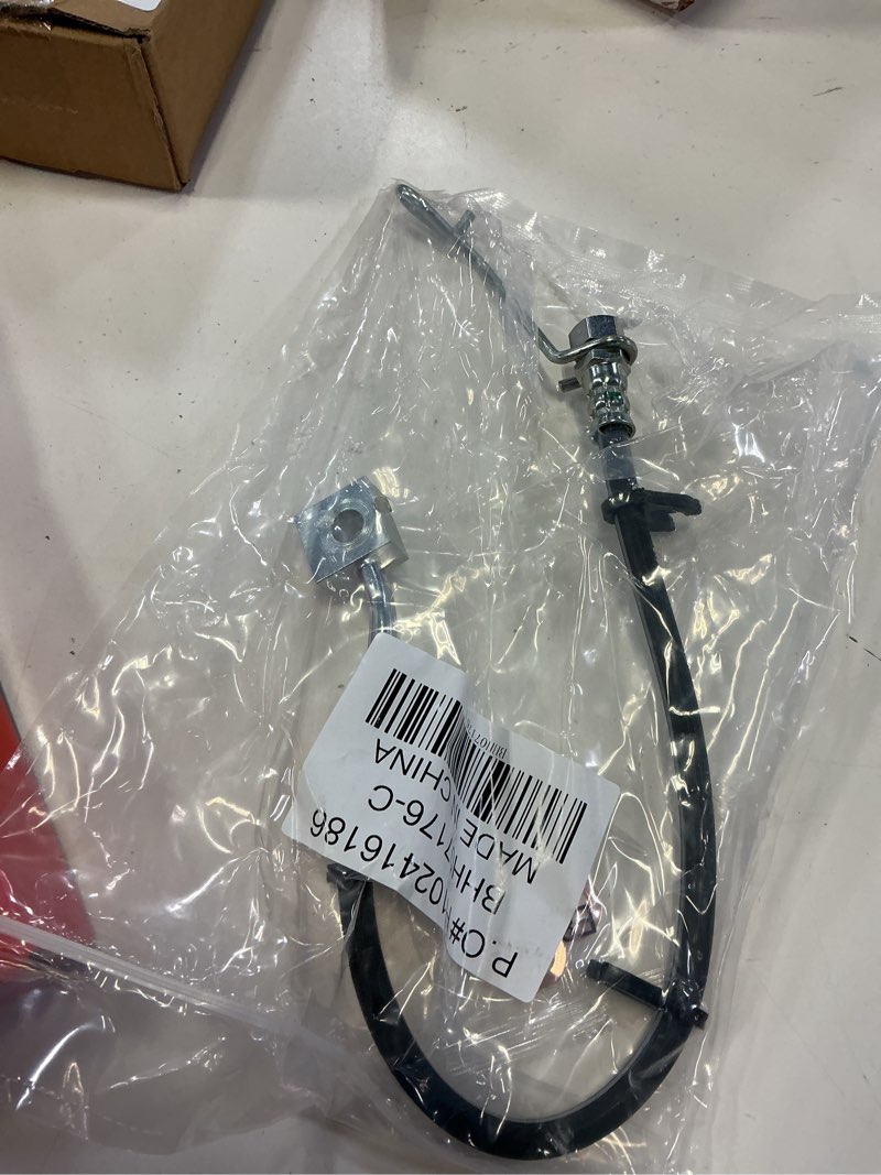 Condition photo showing Good Condition for a-premium rear passenger side brake hydraulic hose compatible with ram models - 1500 2011-2018, without steel line