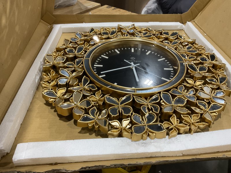 Condition photo showing As Is for gorgeous nanette lepore butterfly wall clock - silver or gold