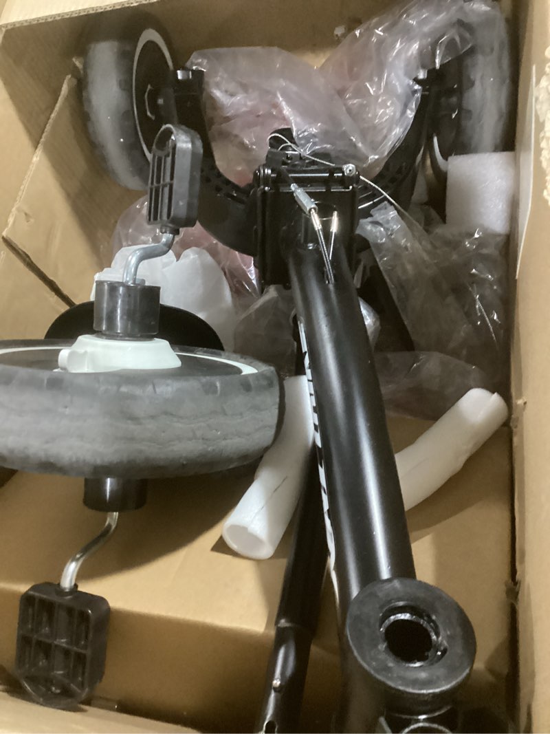 Condition photo showing Good Condition for joovy tricycoo lx premium kids tricycle with 8 stages featuring chunky front tire, removable and adjustable parent handle, machine-washable seat pad, and retractable canopy, black, 1 count (pack of 1) black tricycoo lx