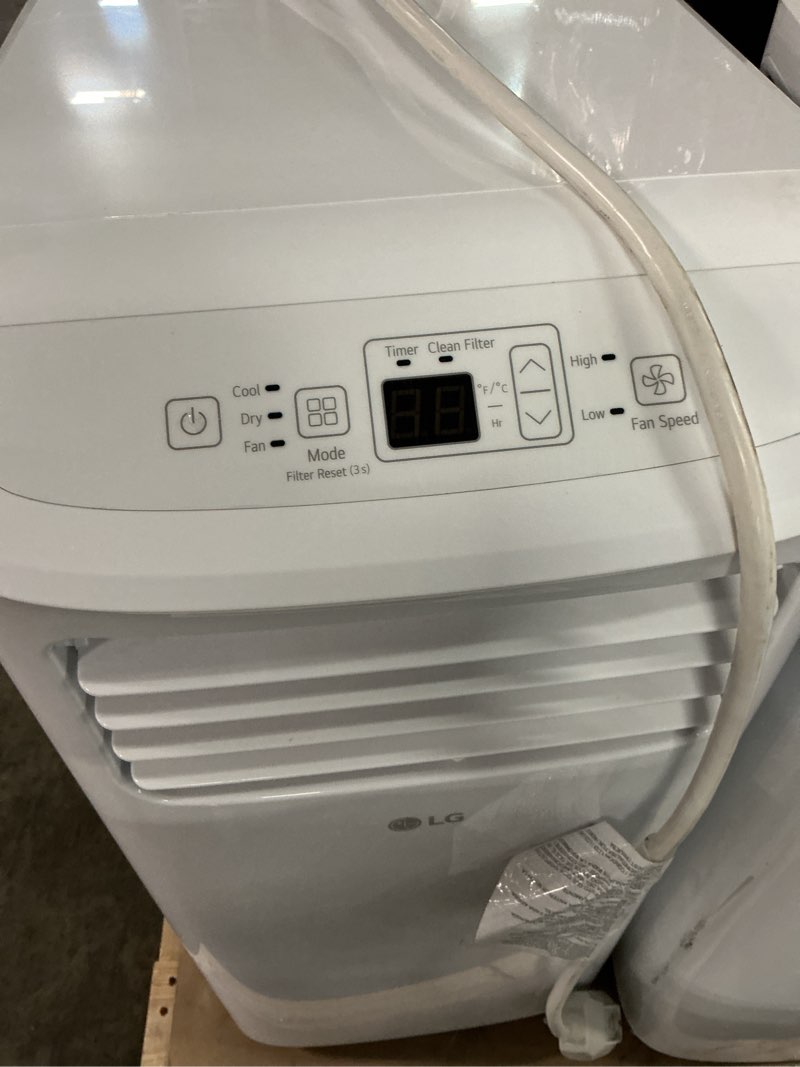Condition photo showing As Is for 6,000 btu (8,765 btu ashrae) 115-volt portable air conditioner cools 250 sq. ft. with dehumidifier and lcd remote