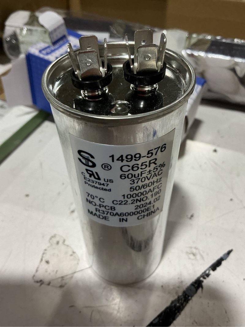 Condition photo showing As Is for 14995761 1499-5761 run capacitor 60uf 370vac 50/60hz 10000afc rv air conditioner (14995761)