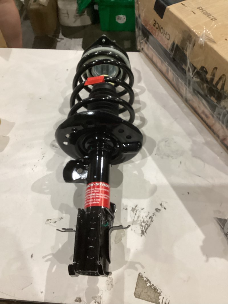 Condition photo showing As Is for monroe quick-strut 172200 suspension strut and coil spring assembly for chevrolet malibu