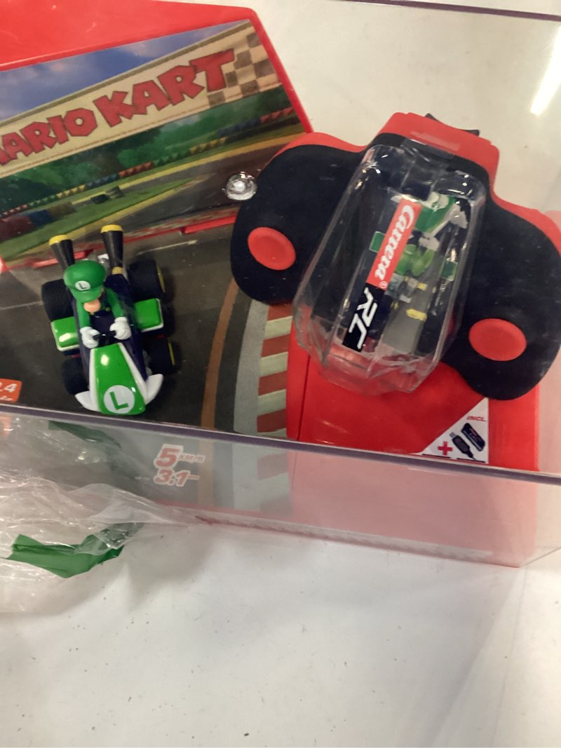 Condition photo showing Good Condition for carrera rc nintendo mario kart 2.4 ghz mini collectible radio remote control toy car vehicle - luigi