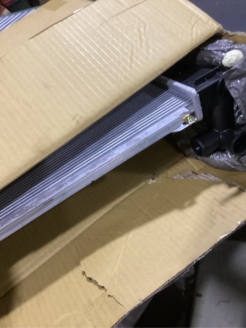 Condition photo showing As Is for TRQ Radiator Assembly Aluminum Core Cross Flow Compatible with 2012-2017 Hyundai Azera 2011-2014 Hyundai Sonata L4 2.4L 2014-2016 Kia Cadenza 2011-2015 Kia Optima L4 2.4L HY3010171 CU13191 RDA82801