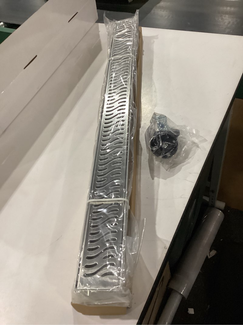 Condition photo showing New/Like New for sharp-tec linear shower drain, 32 inch shower drain with removable pattern cover, brushed nickel 304 stainless steel rectangle floor drain, adjustable feet and hair strainer included (model 101) brushed nickel 32 inch