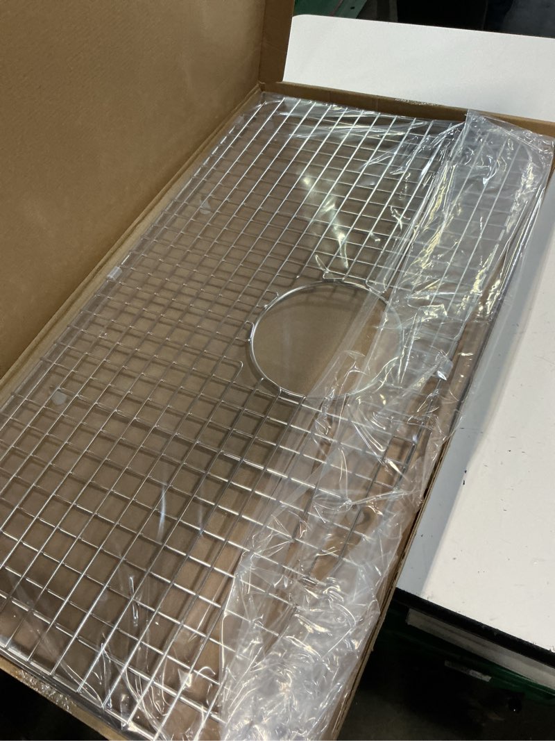 Condition photo showing Good Condition for 25.5 in. x 13.5 in. rear drain sink grid with supersoft silicone feet in 304 grade stainless steel