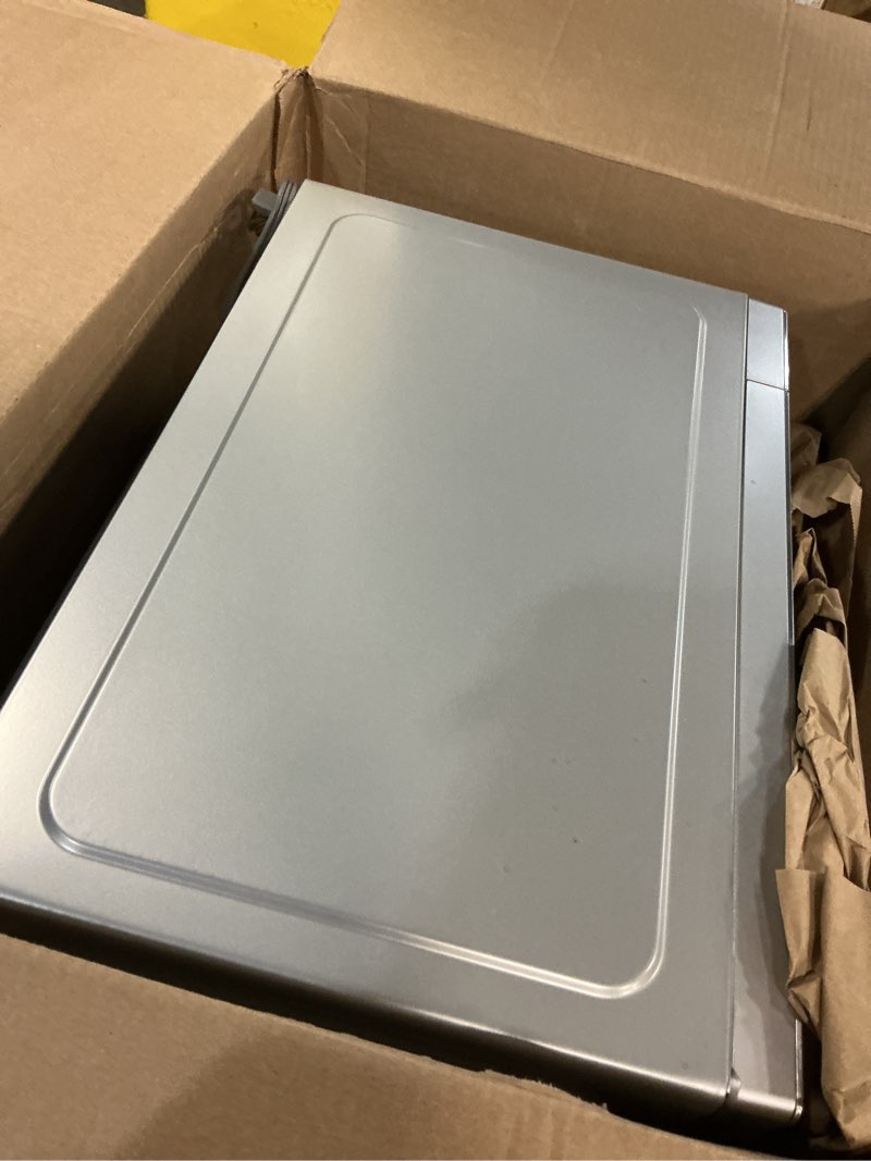Condition photo showing As Is for kenmore countertop microwave, 6 auto-preset menus, child lock, defrost & express cooking features, 900 watt, .9 cu ft, stainless steel stainless steel 0.9 cu ft
