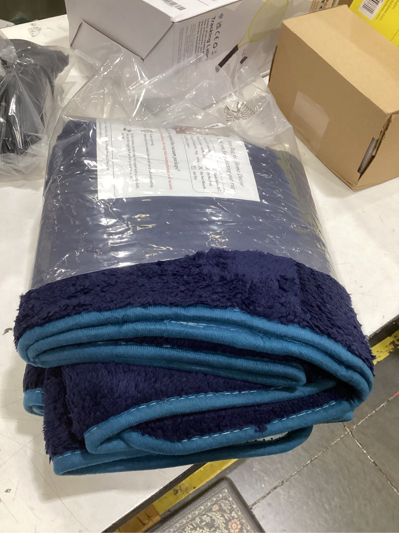 Condition photo showing Good Condition for gifeas ultra soft modern runner rugs for living room bedroom, 2x6 feet navy blue thickened memory foam indoor solid minimalist carpets, non-slip comfy area rug for boys girls nursery room home decor 2' x 6' (rectangular) navy blue
