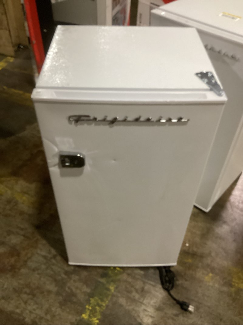 Condition photo showing As Is for Frigidaire Retro Compact Refrigerator with Chiller, 3.2 cu ft Countertop Fridge, Built-In Bottle Opener, Rounded Corners, Premium, for Office, Bedroom, Dorm Room, Cabin, 18.5D x 20W x 31.5H (White) White Solid