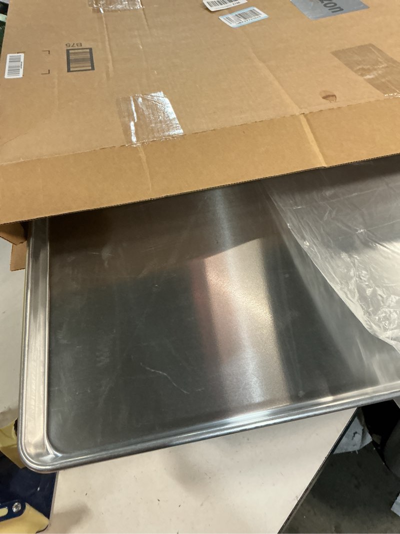 Condition photo showing Good Condition for Restaurantware Met Lux 26 x 18 Inch Industrial Baking Pan 1 Heavy-Duty Full-Size Bakery Sheet Pan - Rimmed Edges Endures Up To 392F Aluminum Sheet Pan Dishwashable Ideal For Baking Or Roasting