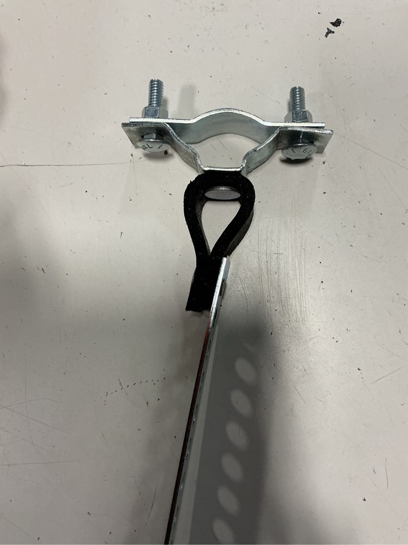 Condition photo showing As Is for cummins onan 1552174 exhaust hanger