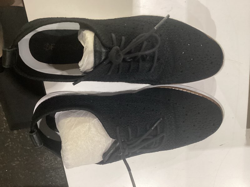 Condition photo showing As Is for cole haan women's originalgrand stitchlite wingtip oxford black knit/optic white 7