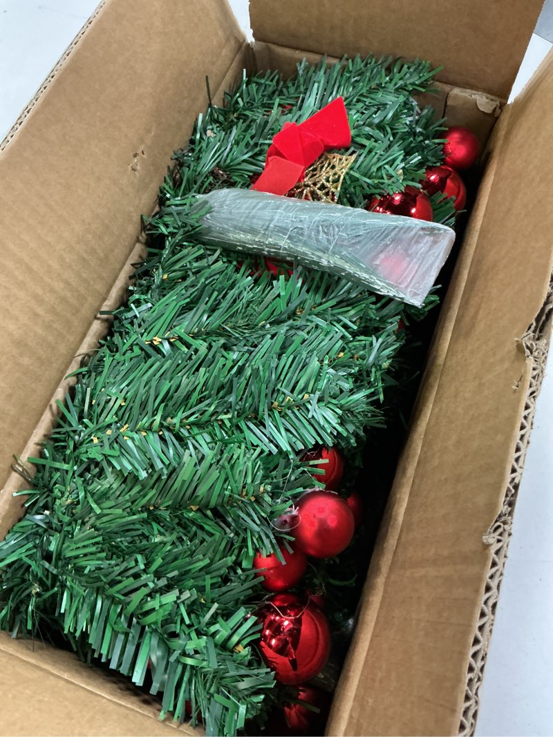 Condition photo showing Good Condition for pre-lit artificial christmas garland, green rattan with red flower decorations and battery operated led lights for home stairs fireplace front porch door display indoor outdoor christmas decor -9ft