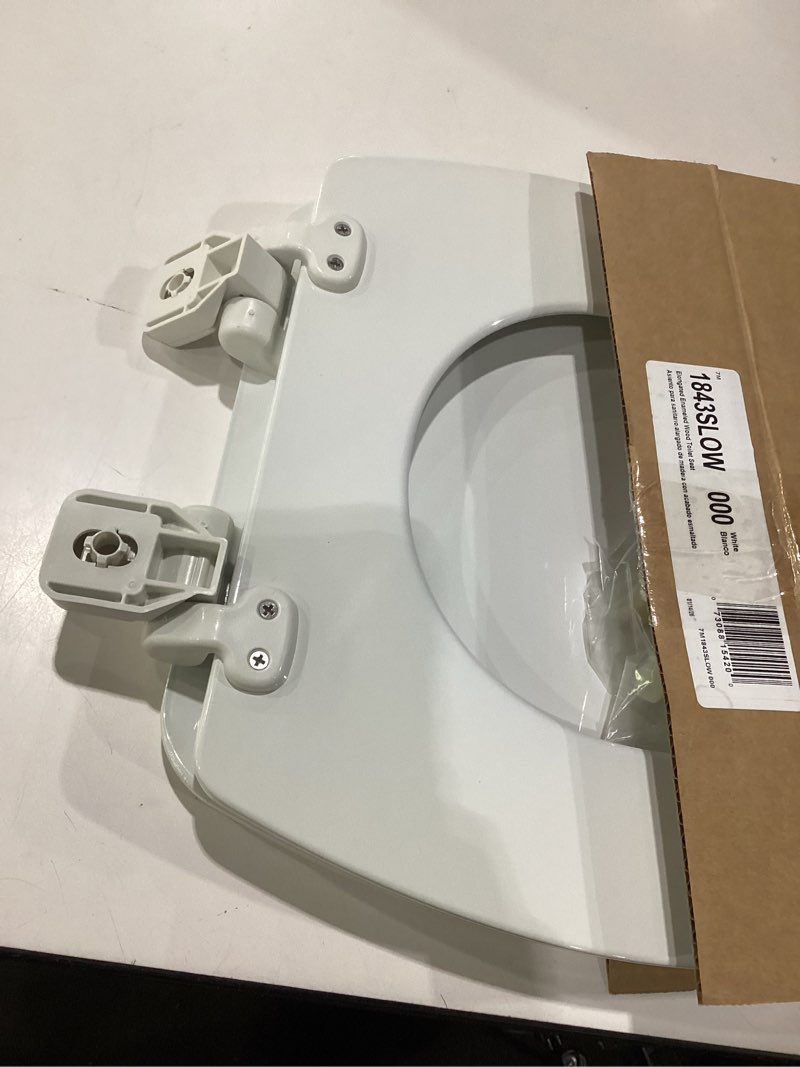 Condition photo showing As Is for mayfair linden slow close toilet seat, non slip heavy duty wood, easy install, elongated, white, crack