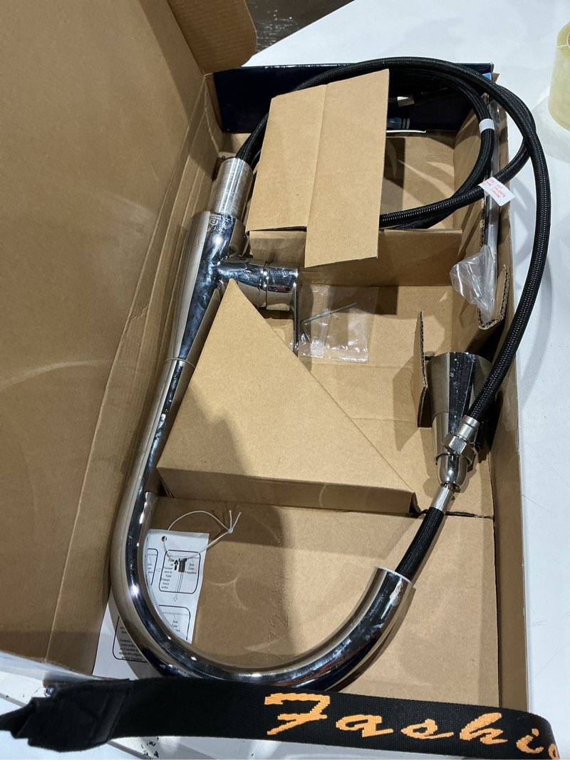 Condition photo showing As Is for project source ellesburg stainless steel single handle deck-mount pull-down kitchen faucet with sprayer (includes deck plate)