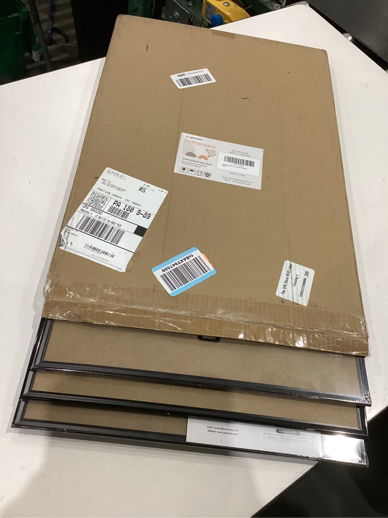 Condition photo showing Good Condition for upsimples 16x24 picture frame black 3 pack, scratch-proof poster frames 16 x 24 for photo gallery - slide-in strips, horizontal or vertical wall mounting
