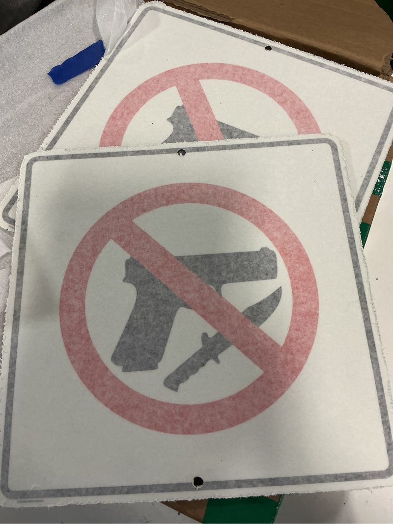 Condition photo showing New/Like New for set of 2 prohibited weapons signs designed to indicate that firearms and knives are not allowed on the premises 14”x14” 