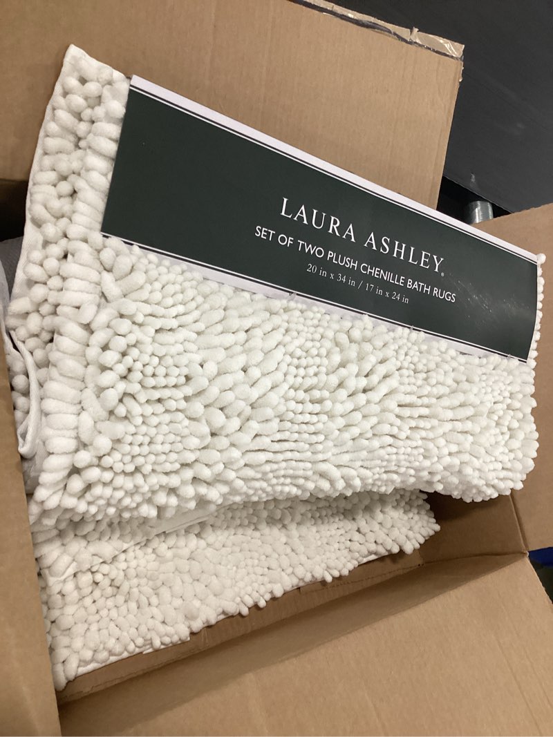 Condition photo showing Good Condition for Laura Ashley – Astor Chenille Bath Mats | Set of 2| 100% Polyester | Premium Bathroom Décor | Machine Washable | TPR Backing | Measures 17” x 24” and 20” x 34” | White