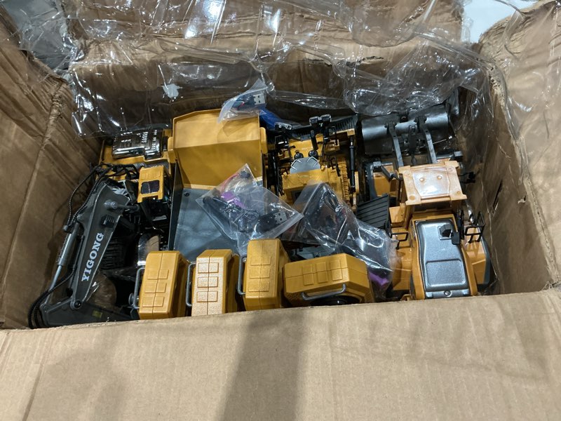 Condition photo showing As Is for yigong remote control excavator 2.4ghz w/ lights & sounds electric engineering