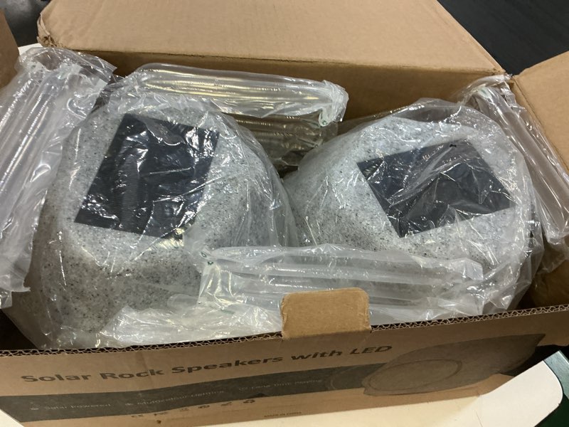 Condition photo showing New/Like New for outdoor solar rock bluetooth speakers with colorful lights, ipx7 waterproof speaker, solar-powered, tws paring, perfect for pool garden and outdoor activities - marble 2 pack (marble 2 pcs)
