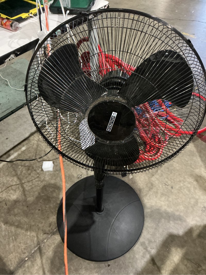 Condition photo showing As Is for utilitech 18-in indoor oscillating pedestal fan, in black with remote