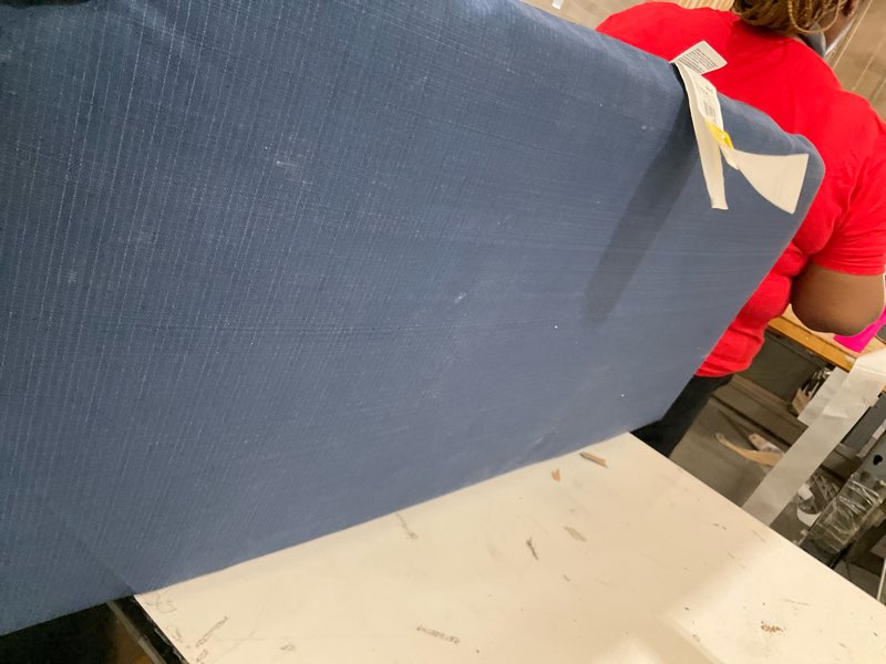 Condition photo showing As Is for outdoor patio furniture cushion 
