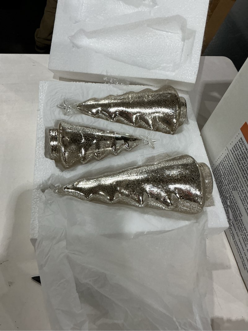 Condition photo showing As Is for Red Co. 8.5”, 11”, 12.5” Light-Up Clear Glass Christmas Tree Tabletop Display Figurine Set of 3 Sizes, Mercury Gold