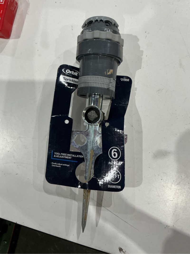 Condition photo showing As Is for orbit h2o-6 5000-sq ft rotating spike lawn sprinkler