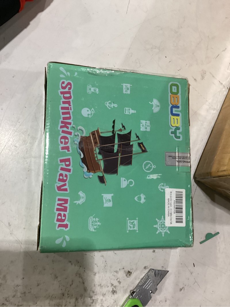 Condition photo showing As Is for sprinkler playmat