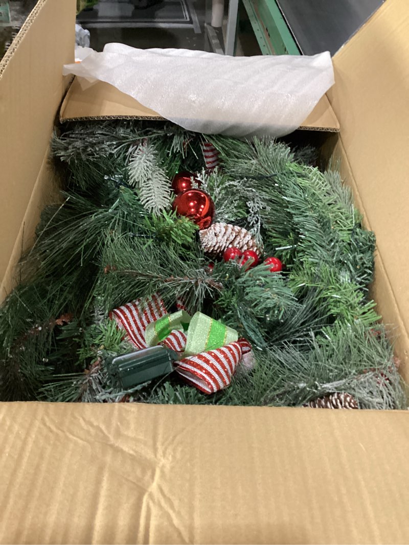 Condition photo showing Good Condition for Valery Madelyn 12 Feet Pre-Lit Christmas Garland with Lights for Mantle, Lighted Outdoor Xmas Garland with Elf Red Green White Balls for Home Stairs Fireplace Table Centerpiece Indoor Holiday Decor