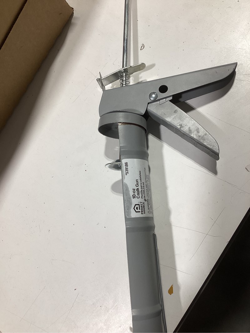 Condition photo showing New/Like New for Project Source 10 -oz Rod Caulk Gun