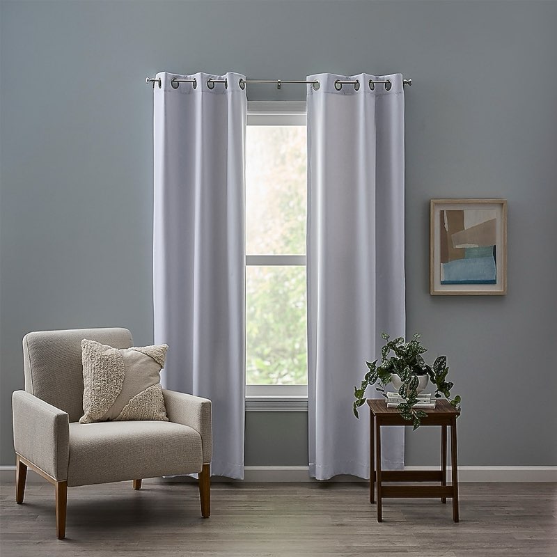  style selections 84-in brilliant white room darkening grommet curtain panel pair