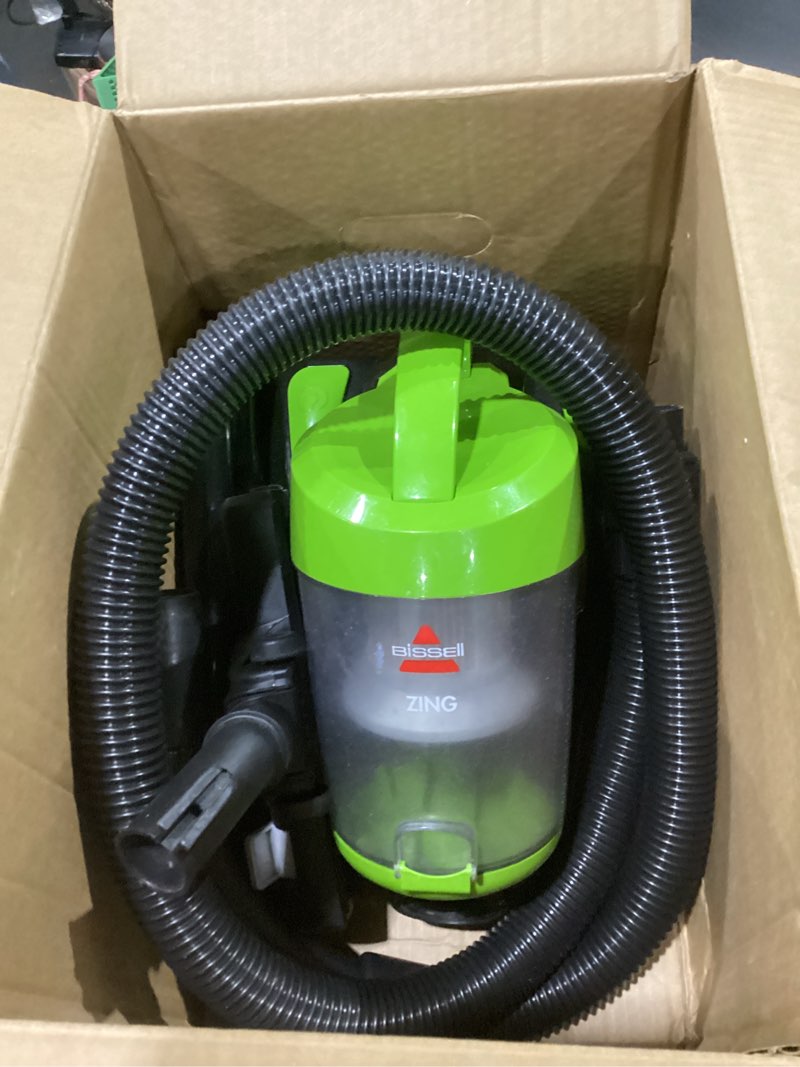 Condition photo showing As Is for bissell 2156a zing canister bagless vacuum zing canister lime, not tested