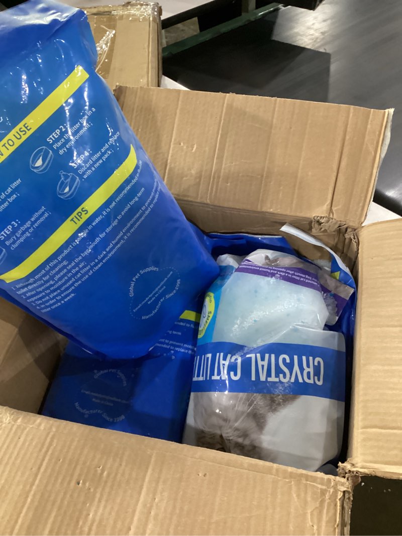 Condition photo showing As Is for crystal cat litter with powerful odor control, non-clumping, lasts up to 3 months, 17.2lb, rapid water absorption, unscented & low tracking lightweight blue & white silica