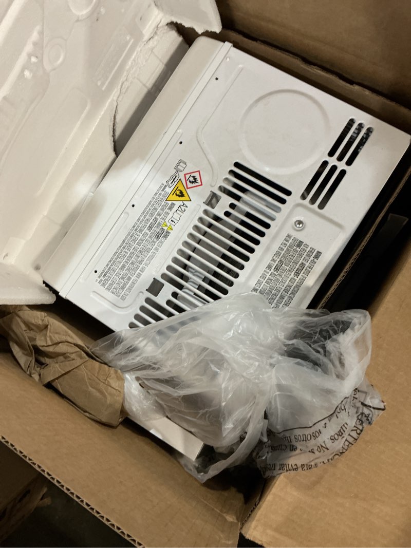 Condition photo showing Good Condition for amazon basics 5000-btu window air conditioner with quiet operation, up to 150 sqf, cool and fan functions, washable filter, adjustable window kit, intuitive mechanical controls, for small room, white white 5000 btu