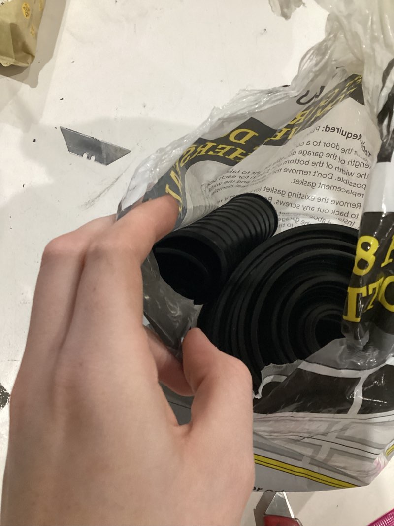 Condition photo showing As Is for wayne dalton 18-ft x 3-in x 0.6 mils black vinyl garage weatherstrip