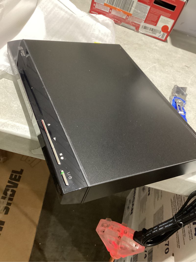 Condition photo showing New/Like New for Sony DVP-SR510H DVD Player (powers on)