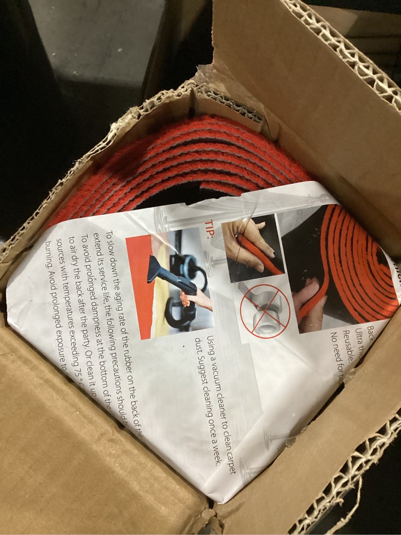 Condition photo showing As Is for PBHEPJ 3ft x 10ft Red Carpet Runner for Party, TPR Rubber Backed Red Rug, Non-Slip,Extra Thick, Wedding and Events Decorations, Reusable