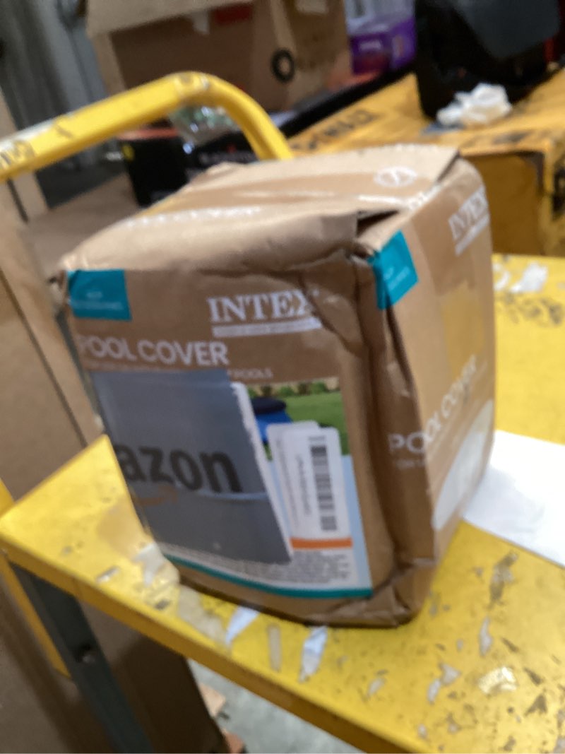 Condition photo showing Good Condition for 10-foot round easy set pool cover by intex