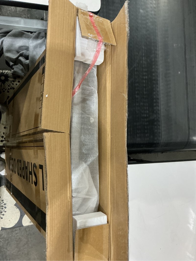 Condition photo showing New/Like New for AODK L Shaped Desk Gaming Desk with LED Light & Power Outlet, 53 Inch Reversible L Shaped Computer Table with Shelf & Storage Bag & Hook for Home Office, Black Black 53 inch