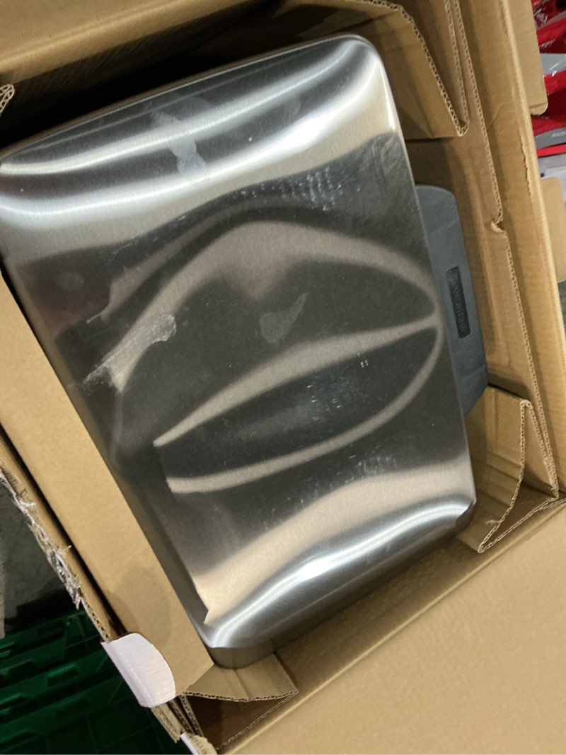 Condition photo showing As Is for tramontina 13 gal step trash can  stainless steel