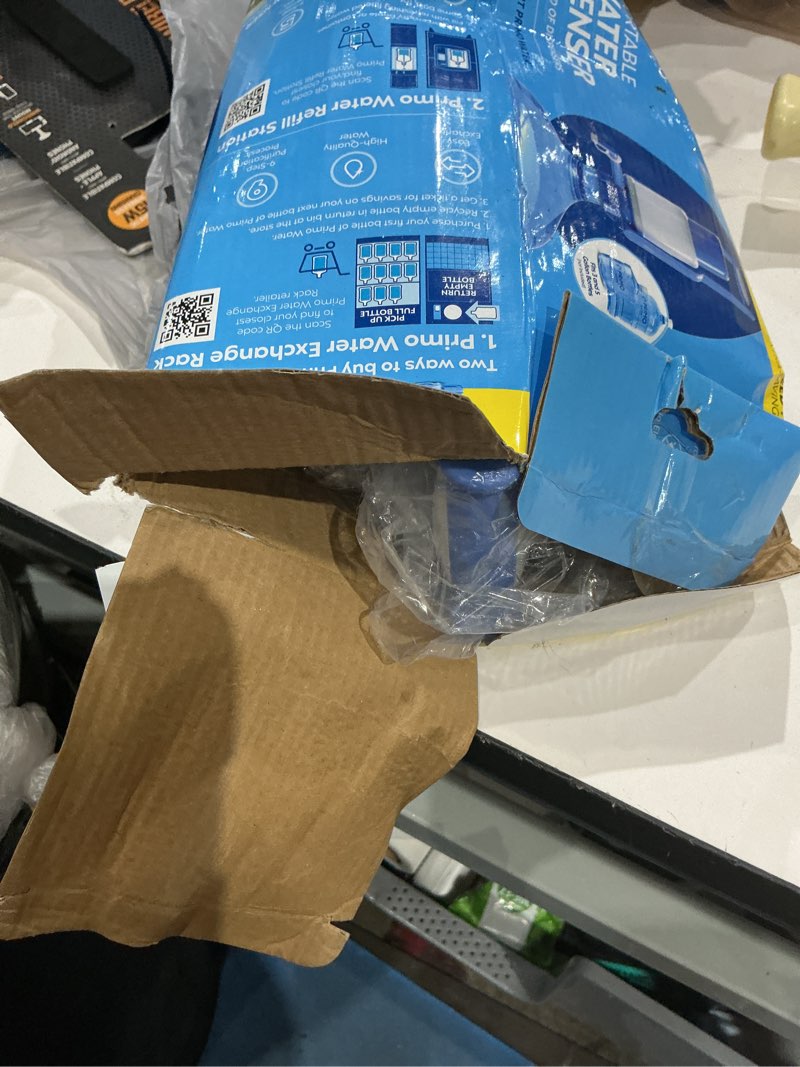 Condition photo showing As Is for primo water portable/manual 3 - 5 gal white water bottle pump w/handle plastic