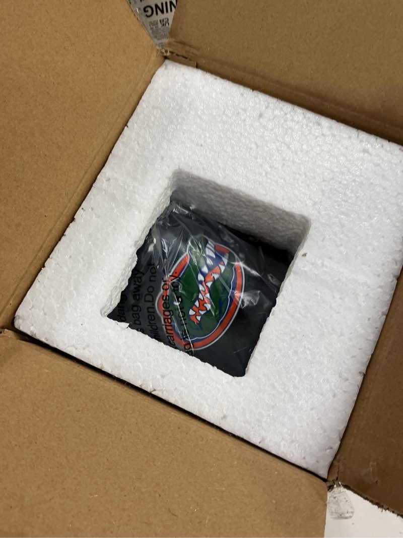 Condition photo showing New/Like New for the memory company officially licensed ncaa - university of florida 15oz artisan black rim mug