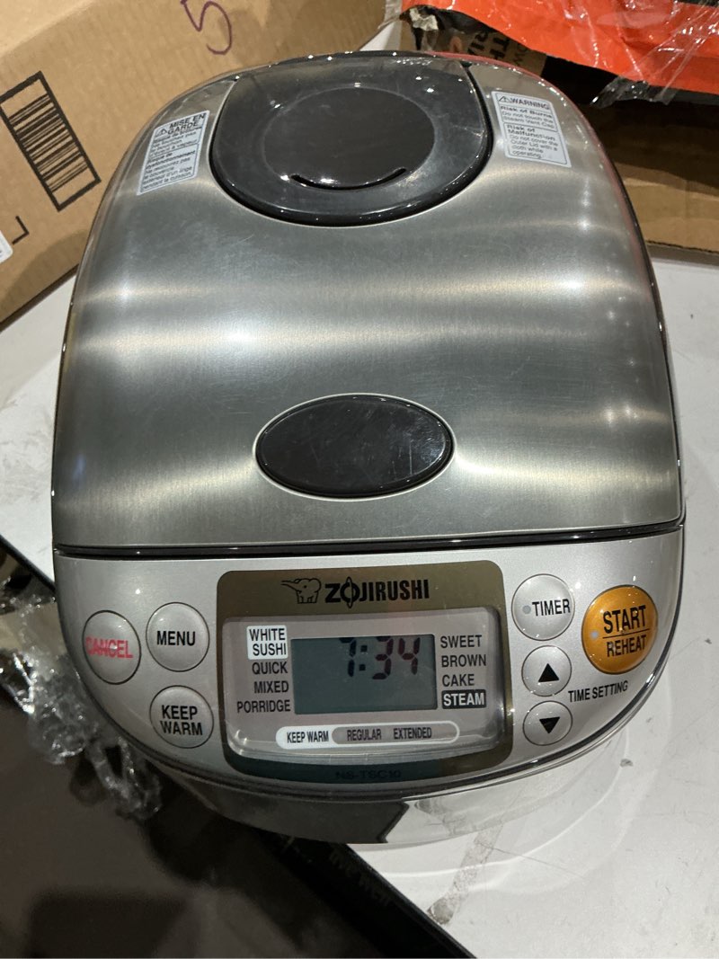 Condition photo showing As Is for zojirushi ns-tsc10 micom rice cooker and warmer 5.5 cup stainless/brown